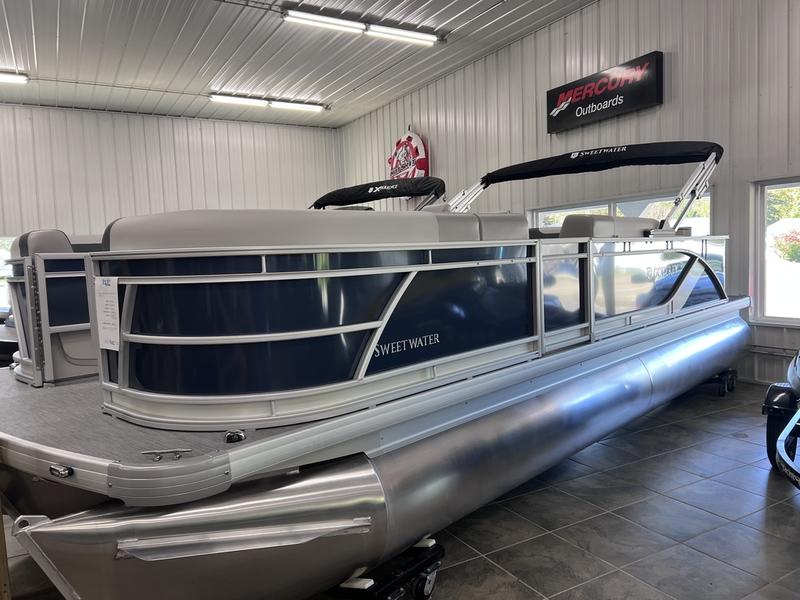 A Sweetwater pontoon on the Lime Lake Marine & RV showroom floor